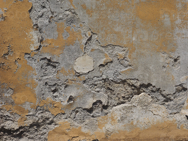 Damage caused by damp and moisture on a wall