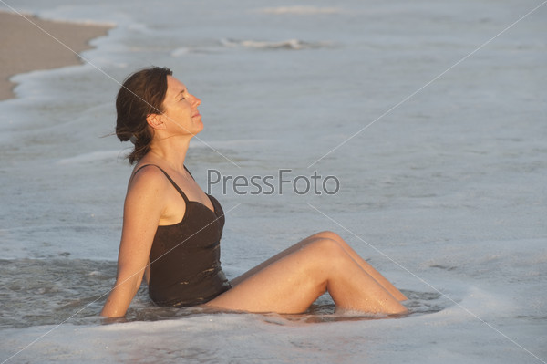 Woman on beach along Mal Pais coastline in San Jose Costa Rica