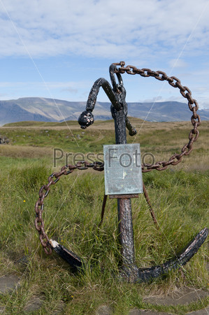Anchor and chain with a plaque in Iceland