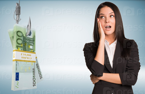 Businesslady in suprise with open mouth and bundle of money on fish-hook on isolated grey background