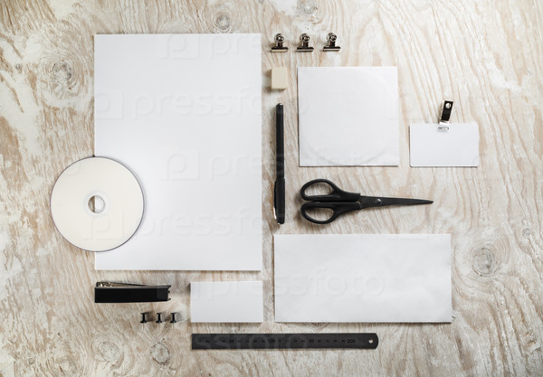 Blank stationery set. Template for branding identity on light wooden background. For design presentations and portfolios.
