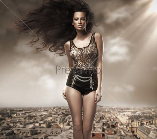 Fresh young beauty over cityscape background