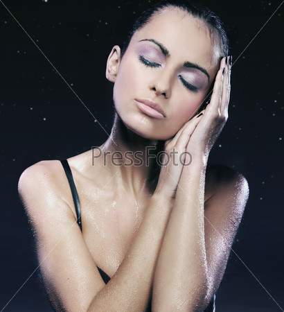 Portrait of a relaxed lady over starry sky