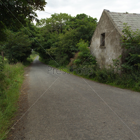 Ireland - countryside road with house
