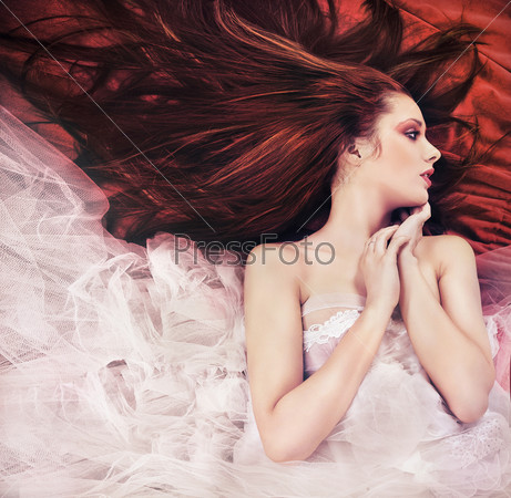 Romantic style photo of a young ginger hair lady