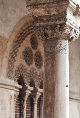 Detail of old weathered column in steri palace sicily italy vertical