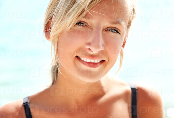 Portrait of a beautiful blond lady smiling