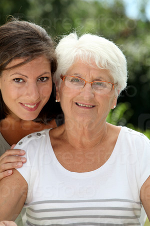 Closeup of elderly woman with grandaughter