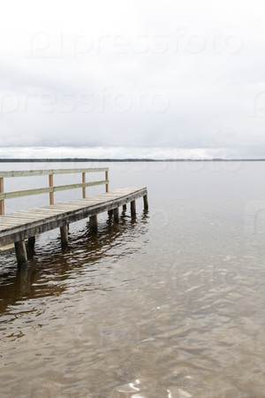 View of a wooden pontoon on a lake
