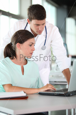 closeup of doctor and nurses in a meeting