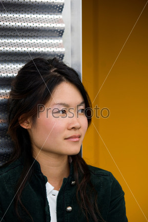 Portrait of an Asian college student looking away