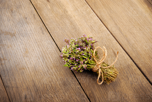 Bunch of thyme herb  on the oak table