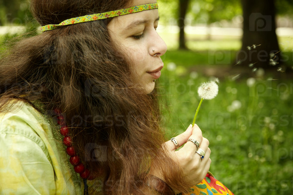 Dreaming or love concept with pierced young woman , selective focus on eye, stock photo