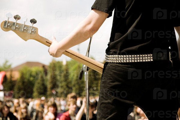 Special toned, focus point on nearest part of musician, stock photo