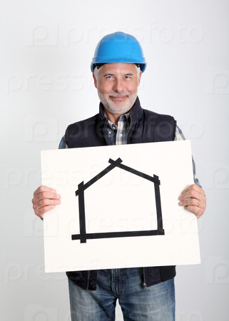 Property developer showing house for sale sign