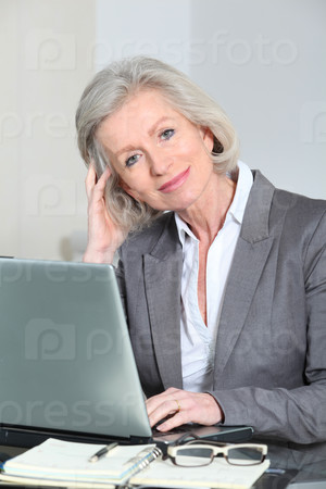 Senior businesswoman working in the office