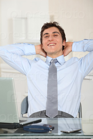 Portrait of relaxed businessman in office