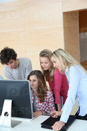 Group of students attending training course at school