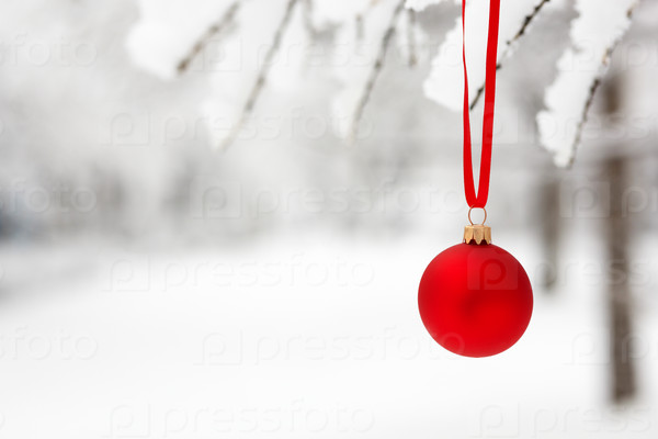 Holiday concept, selective focus on metal part of red sphere, stock photo