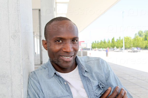 Portrait of relaxed man in urban area