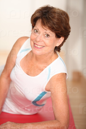 Closeup of senior woman doing stretching exercises