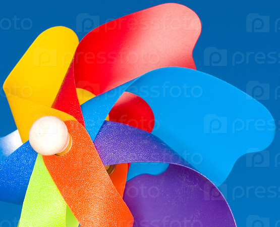 A stock Photograph of a colorful windmil toy.