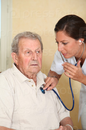 Elderly person with nurse