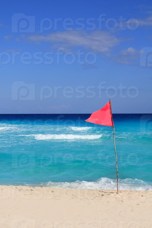 dangerous red flag in beach rough sea signal