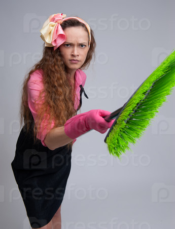 angry housewife with broom