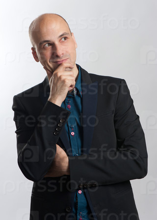 fashionable bald man thinking