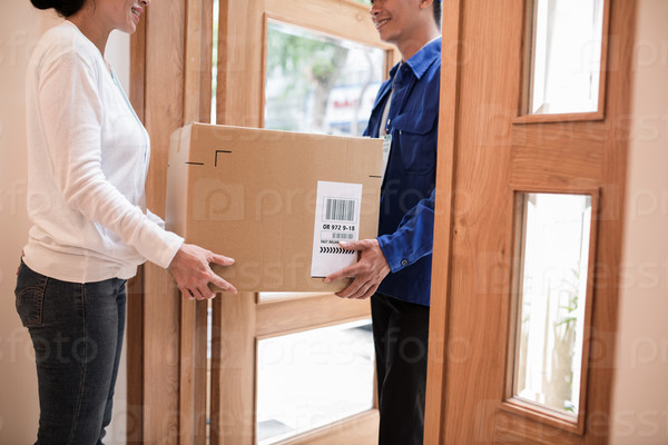 Cropped image of parcel delivery process