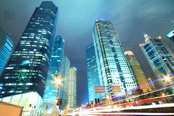 Dreamy blue of modern office buildings at night in Shanghai Far East