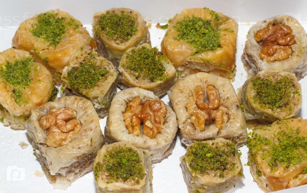 Various kinds turkish baklava with pistachios and walnut in box