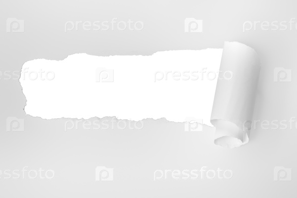 scrap of paper, on white sheet, horizontal photo
