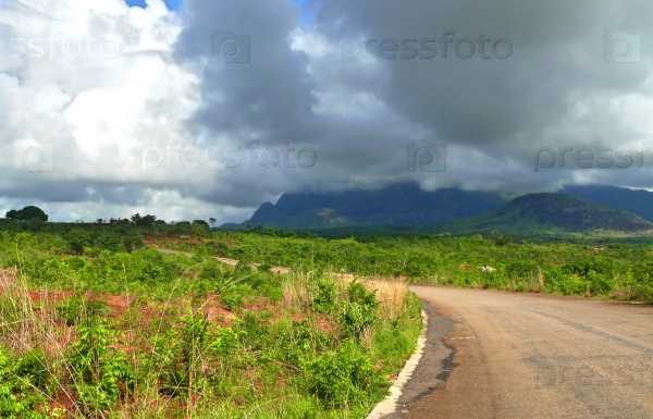 Road in mountains. The cloudy sky. Africa, Mozambique.