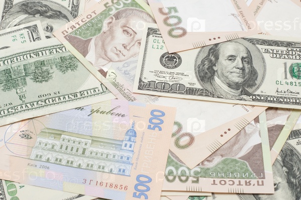 the many dollars and ukrainian money. money background