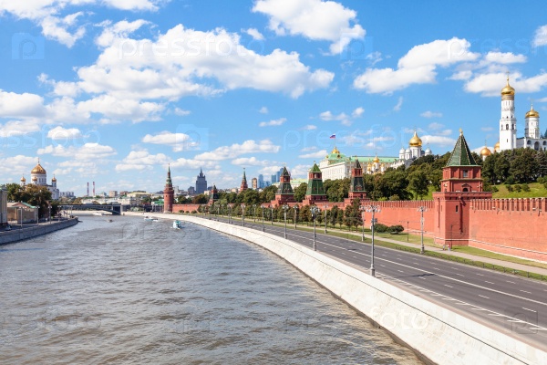 Moscow skyline - Kremlin embankment along Moskva River and Kremlin Cathedrals in Moscow in sunny summer day