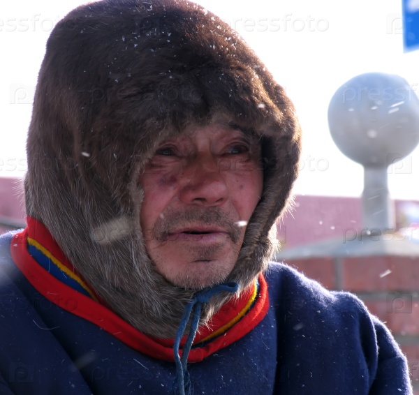 Nadym, Russia - March 11, 2005: the national holiday, the day of the reindeer herder in Nadym, Russia - March 11, 2005. Unknown man Nenets close-up, portrait.