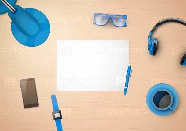 Creative workplace with white paper and stylized in blue color household items and gadgets. Top view, stock photo