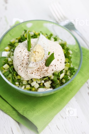 Chopped salad with egg, ramson and mayonnaise