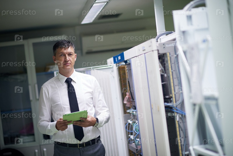 network engineer working in server room
