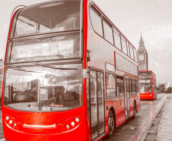 Vintage looking Red Double Decker Bus in London over desaturated black and white background