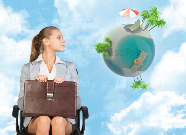 Businesswoman with suitcase smiling and looking at Earth on sky background