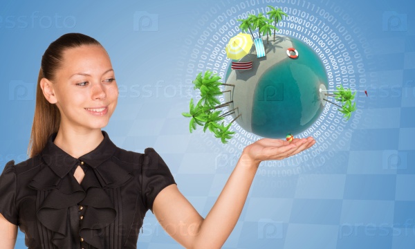 Businesswoman smiling and looking at Earth on abstract blue background