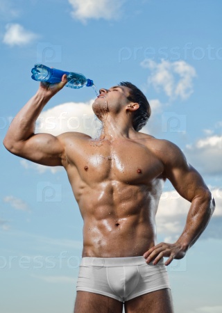 the very muscular handsome sexy guy on sky background, drink\
water, focus on face