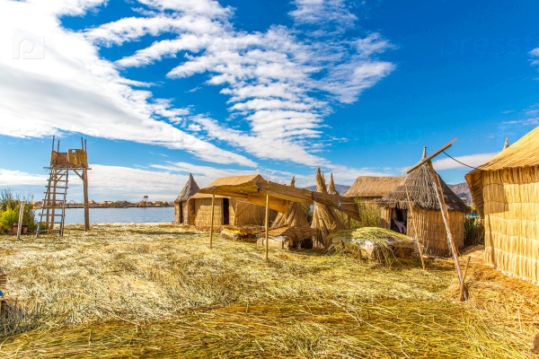 Floating  Islands on Lake Titicaca Puno, Peru, South America. Dense root that plants Khili interweave form natural layer about one to two meters thick that support islands