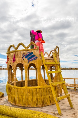 Traditional reed boat lake Titicaca,Peru,Puno,Uros,South America,Floating  Islands,natural layer about one to two meters thick that support islands