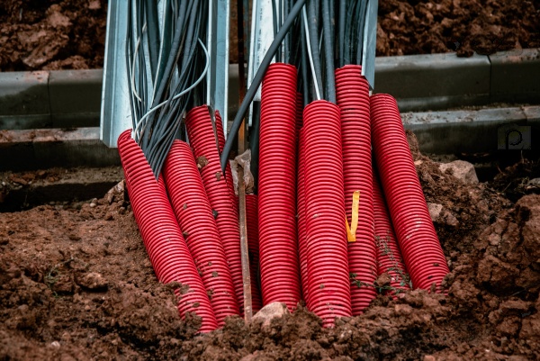 Plastic pipes containing electric cables