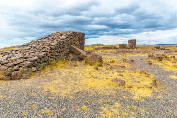Funerary towers in Sillustani, Peru, South America- Inca prehistoric ruins near Puno, Titicaca lake area.