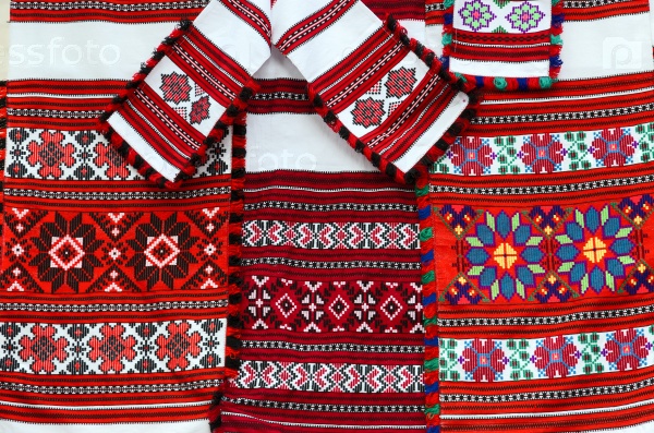 Three colorful belorussian towel and napkins with geometric pattern